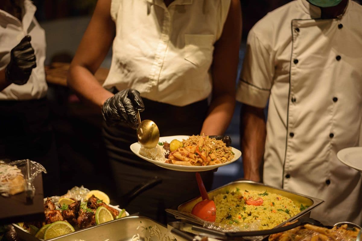 SpagKing chefs serving at a catering event